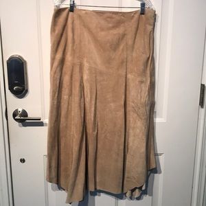 Suede skirt, handkerchief hem, lined with side zip